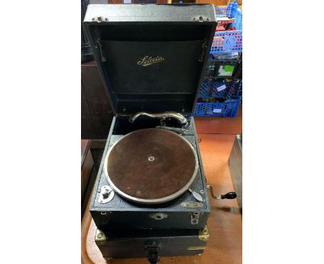 A vintage HMV record player and one other player 