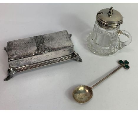 A silver plated stamp box, in the style of WMF; with a glass mustard pot with silver hinged cover; and a silver spoon with an