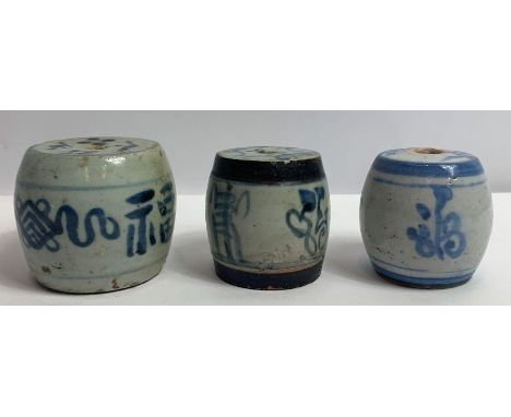 Three Chinese blue and white scroll weights 