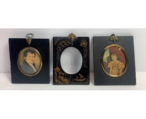A 19th century portrait miniature of a gentleman, in an ebonised frame; together with another miniature of a Georgian child; 