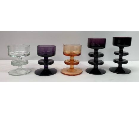 Ronald Stennett-Willson - two amethyst glass Sheringham two ring candlesticks; together with three Sheringham one ring candle