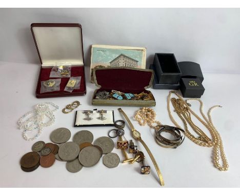 A small collection of silver and costume jewellery, various enamel badges including Butlins, a quantity of postcards with som