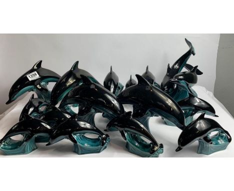 A collection of Poole Pottery dolphins 