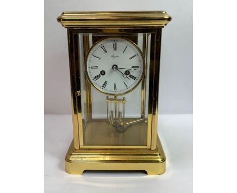 A late 20th century 4 glass brass cased mantle clock; 2 train movement striking on 2 brass bells (ting tang strike): the whit