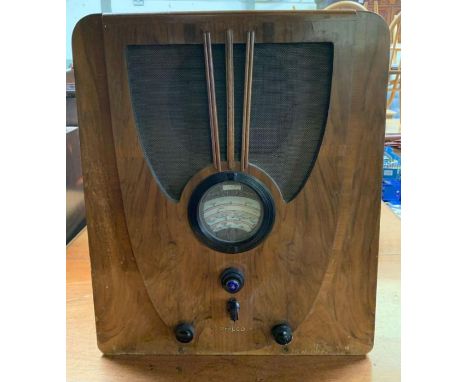 A vintage Art Deco radio, in a walnut case 