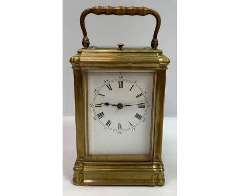 A late 19th century French 2 train carriage clock with repeat strike, within a pillared stepped case, plain enamel dial strik