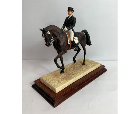 A Border Fine Arts figure of a dressage horse and rider, model number B0278, marked to the base K R Donaldson, 269/850, gold 