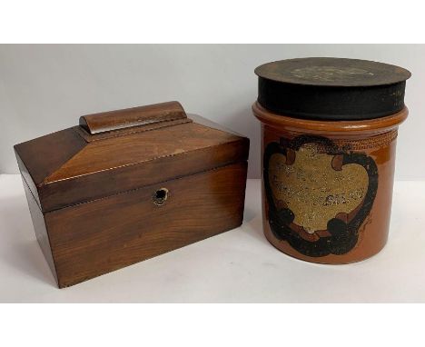 A 19th century stoneware tobacco jar and cover, along with a mahogany tea caddy 