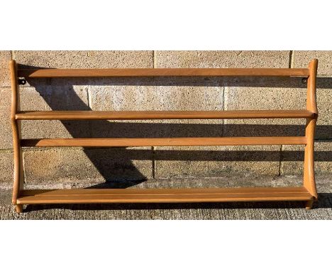 An Ercol beech and elm hanging rack, 50cm high, 97cm wide, 13cm deep