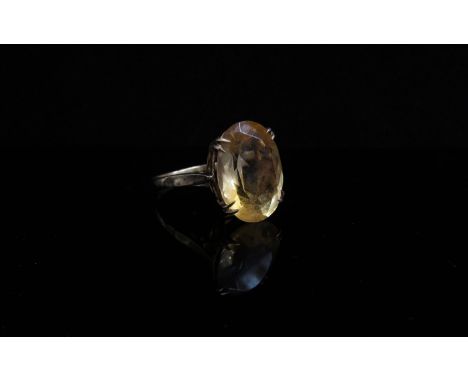 A 9ct gold ring set with oval citrine. Size R, 4.4g