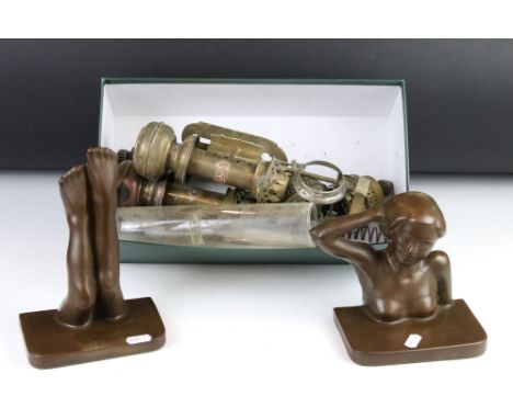 A pair of brass light fitting both marked G.W.R. together with a pair of resin book ends in the female form. 