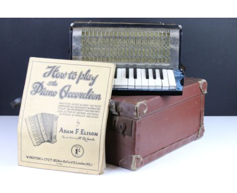 A vintage Estrella piano accordion complete with instruction book and original case. 