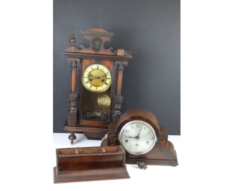 A wooden wall clock together with a mantle clock and a wooden desk tidy. 