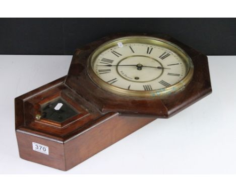 A vintage wooden cased wall clock, the dial marked 'Seth Thomas'. 