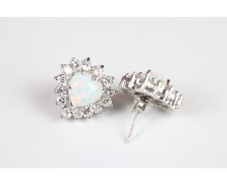 A pair of silver CZ and opal panelled stud earrings. 