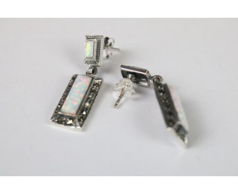 A pair of silver marcasite and opal panelled art deco style earrings. 