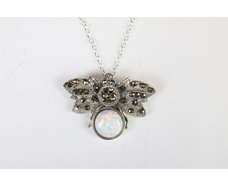 A silver bug pendant necklace with opal panel and marcasite's. 