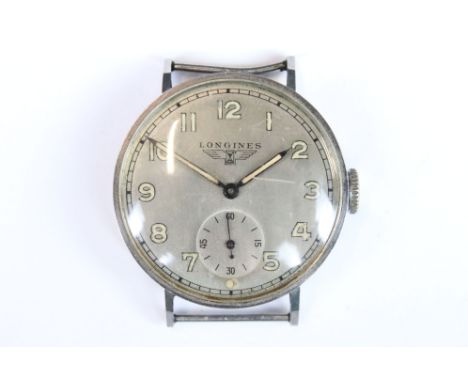A vintage gents Longines wristwatch with sub second dial to 6 o'clock and silvered dial. 