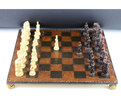 A Wellington &amp; Napoleon hand painted chess set together with chess board. 