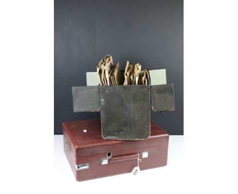 Vintage portable HMV gramophone, model 102, with scarce luxury red rexine leathercloth covering, circa 1935 together with a b