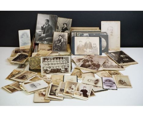A collection of Victorian CDV Carte De Vista calling cards together with a quantity of early portrait and group photographs t