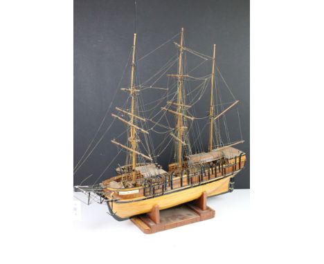 Wooden scale model of the ship 'Charles M Morgan', with three fully rigged masts, deck fittings and life rafts, planked hull,