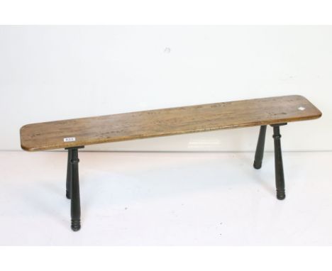 A vintage cherry wood long bench. 