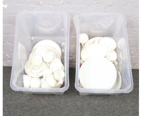 Two boxes of white ceramic dinner wares, Duchess Bone China Ascot example, dinner plates, side plates, tea cups and saucers, 