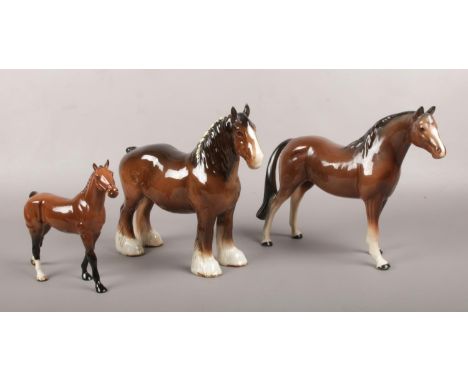 Three ceramic figures of horses, to include Beswick shire horse, Royal Doulton and Melba Ware.  Good condition.