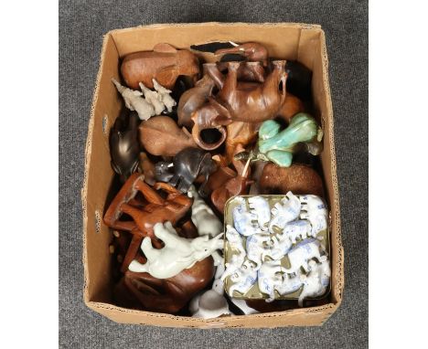 A box of elephant figures, to include ceramic and wooden examples.  