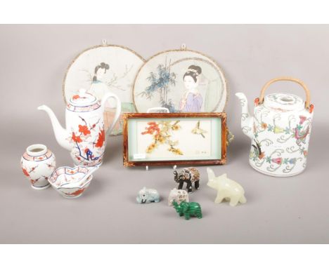A collection of oriental collectables, ceramic vase, coffee pot, elephant figures etc  