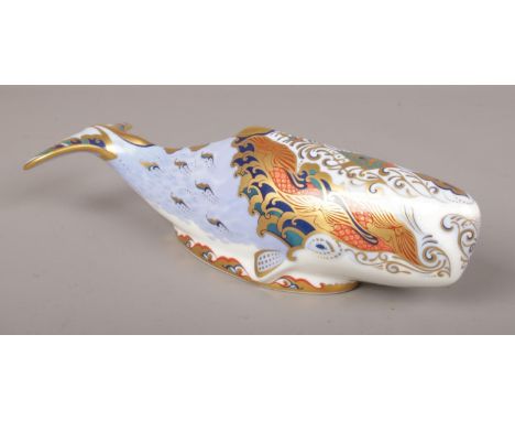 A Royal Crown Derby ceramic figure of an Oceanic Whale, gold stopper.  Good.