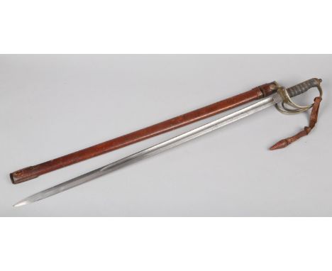 An 1821 pattern Royal Artillery Officers sword by Fenton Brothers Ltd. Sheffield. In leather mounted scabbard and with wirewo