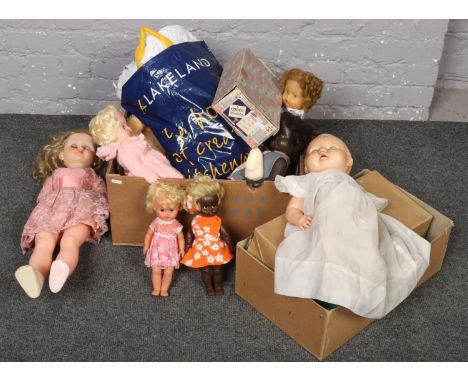 Two boxes of mainly vintage children's dolls, Codeg, Kader examples with dolls clothes  