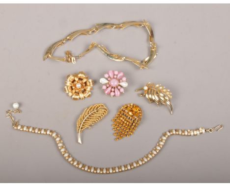 A collection of vintage costume jewellery including Trifari and Kramer etc.  