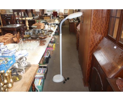 A floor standing reading lamp
