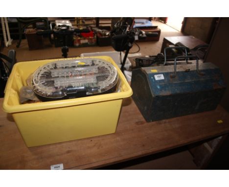 A metal tool box and contents together with a plastic box of various tools 
