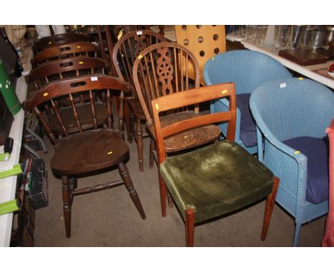 A pair of stick and wheel back dining chairs; together with a teak chair 