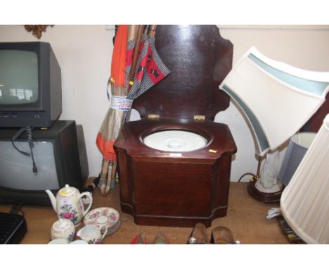 A mahogany commode 