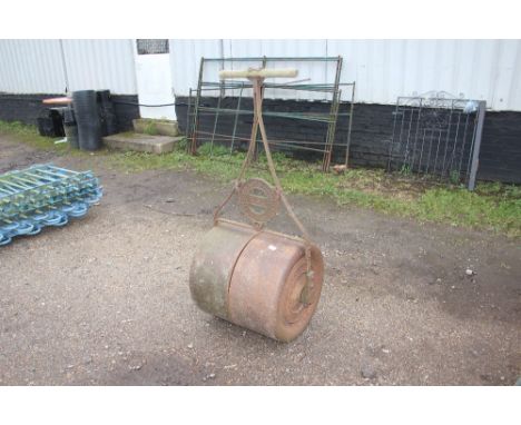 A metal garden roller