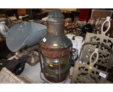 A copper and glazed anchor ship's light 