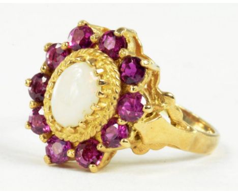 A RUBY AND OPAL CLUSTER RING IN 9CT GOLD, 3.8G GROSS