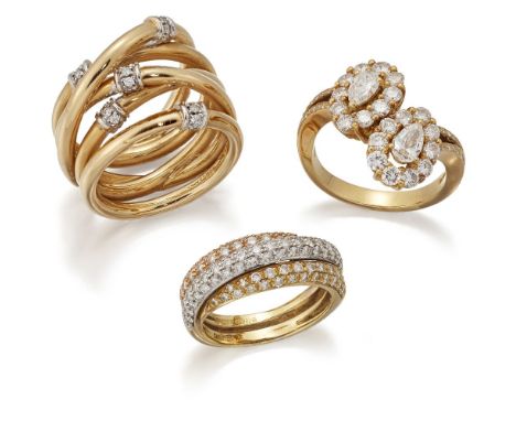 Three diamond rings, comprising: a ring of crossover design set with two pear-shaped diamonds framed by brilliant-cut diamond