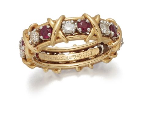 Schlumberger for Tiffany &amp; Co, a ruby and diamond eternity ring, alternately set with brilliant-cut diamonds and circular