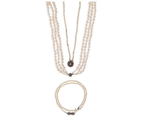 Three cultured pearl necklaces, one fresh water cultured (3) the first a double graduated row to a gold, amethyst and seed pe