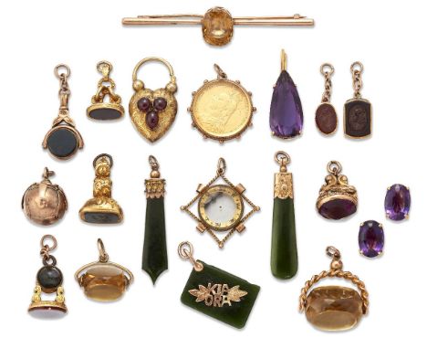 A collection of jewellery: comprising; eleven various fob seals; a zircon bar brooch; a pair of amethyst ear clips and matchi