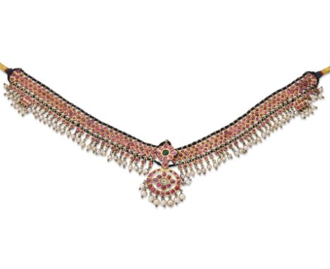 A 20th century silver gilt gem and enamel necklace, composed of closed-set ruby articulated chevron panels, suspending in the