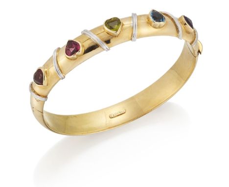 Theo Fennell, a gem-set bangle, inset with heart-shaped garnet, tourmaline, peridot and blue topaz, signed Fennell.Good condi
