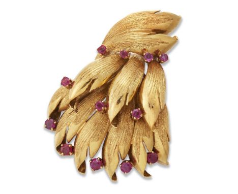 An Italian, ruby brooch, of stylised foliate design, each petal with single claw-set ruby, stamped Italy, 18k, length, 6cmgro