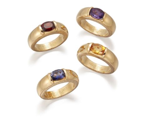 Chaumet, a set of four gem-set band rings, by Chaumet, each set with an oval amethyst, citrine, garnet and tanzanite, respect